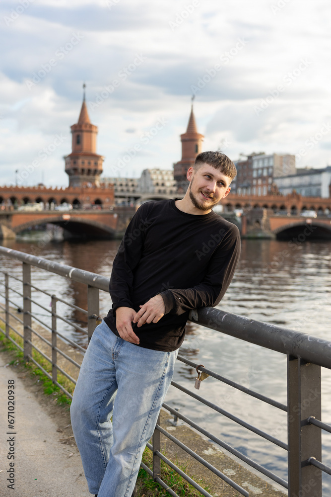Fototapeta premium handsome man on the bridge 