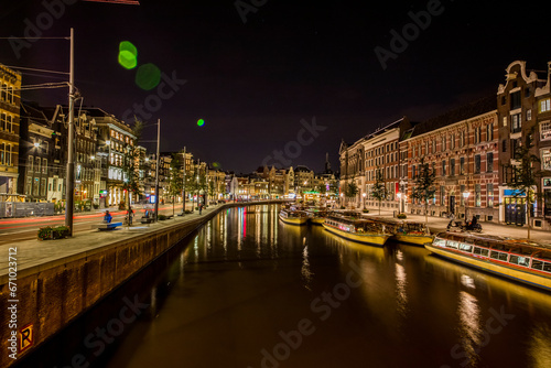 modern Amsterdam city center, canals and bridges.