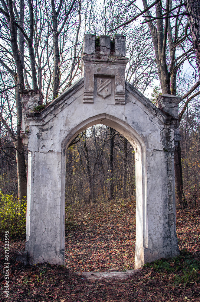 Ancient stronghold entrance ruin concept photo. Parkland overlooking from the yard.