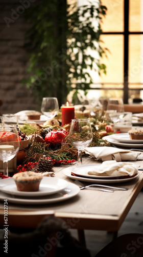 Large breakfast dinner table on a table with festive atmosphere in light brown and red