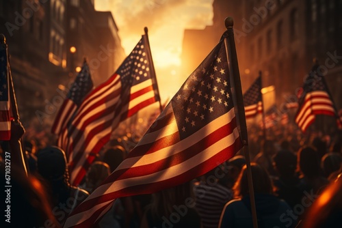 American flags fluttering above the crowd of people marching in the city street. American symbol illuminated by bright sun. 4th of July Independence Day concept. The main holiday of the USA. © Georgii