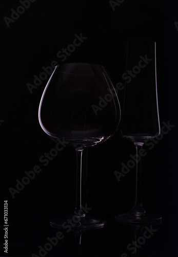 Empty wine glass isolated on black