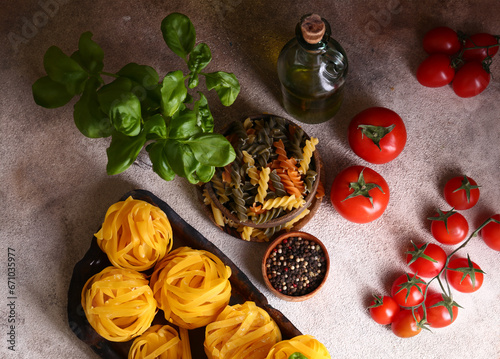 Fototapeta Naklejka Na Ścianę i Meble -  ingredients for making pasta - tomatoes, basil, garlic