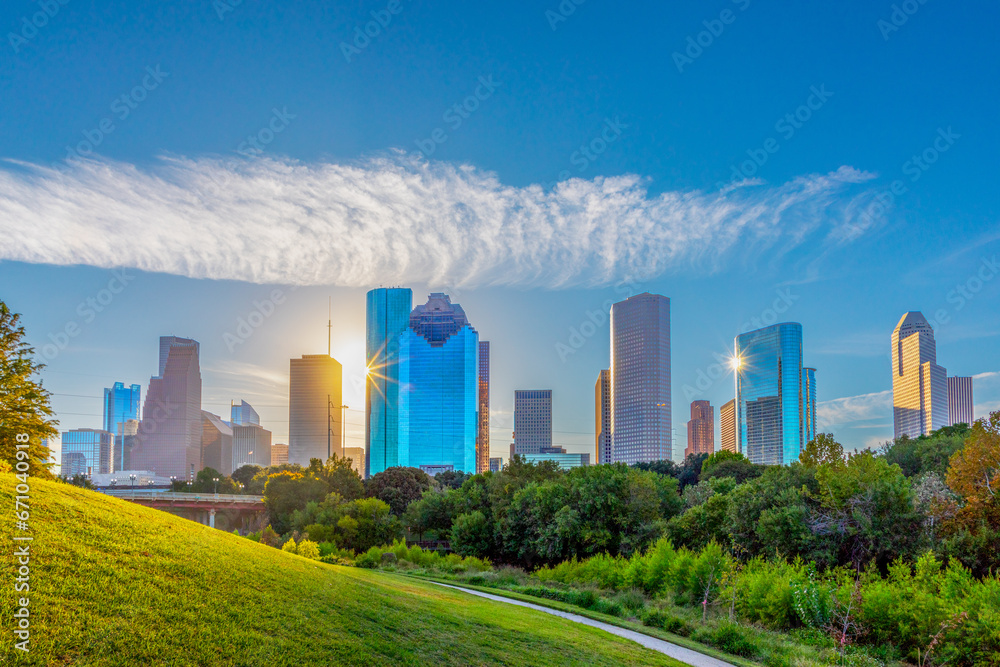 skyline of Houston, Texas in morniong light seen from Buffalo bayou park skyline of Houston, Texas in morniong light seen from Buffalo bayou park