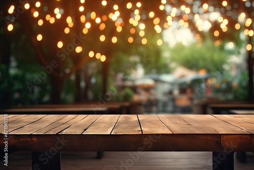 An outdoor empty table with blurred busy cafe background