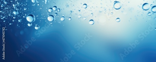 Defocused Water Surface With Bubbles And Blurring Blue Color
