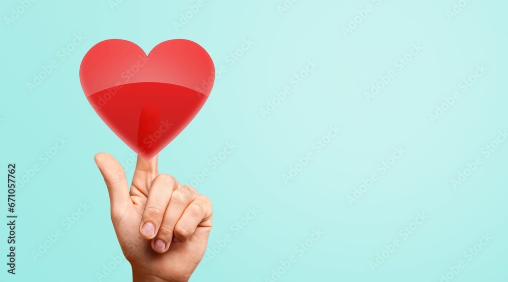 Hand hold red heart shape