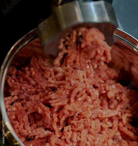 meat is minced in a meat grinder