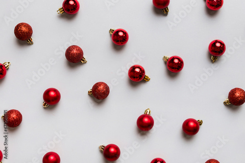 Christmas composition. a pattern of christmas balls on colored background. Flat lay, top view New year decor