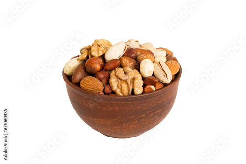 Roasted mix nut in bowl isolated on white background. mix nut is snack or raw of cook. Healthy food concept