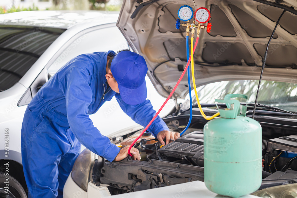 Repairman check and fixed car air conditioner system, Technician checked car air conditioning system refrigerant recharge, Air Conditioning Repair