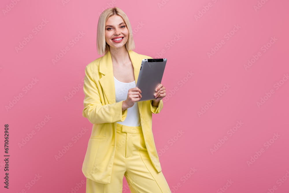 Portrait of elegant gorgeous person toothy smile hands hold tablet coworking isolated on pink color background Portrait of elegant gorgeous person toothy smile hands hold tablet coworking isolated on pink color background