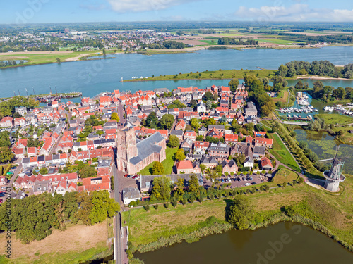 Aerial from the historical city Woudrichemm at the river Merwede in the Netherlands photo