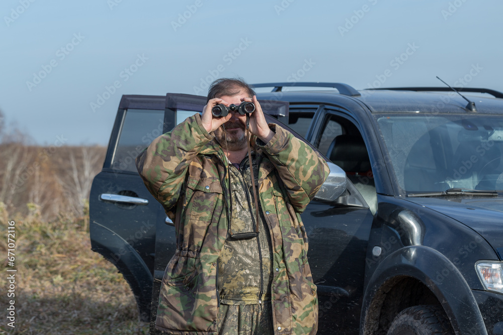 Man with binoculars