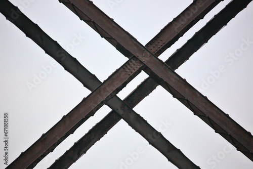 train trestle steel bar detail forming an x shape, abstract (moodna viaduct) close up of metal reinforcements infrastructure