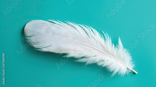  a white feather laying on a blue surface with a green background. generative ai