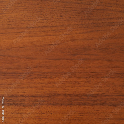 Walnut wood grain texture. Natural horizontal pattern. Warm brown. 