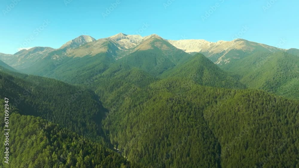 Aerial video over Pirin mountains, moving towards the tallest peaks: Vihren, Kotelo and others. Aerial video over Pirin mountains, moving towards the tallest peaks: Vihren, Kotelo and others.