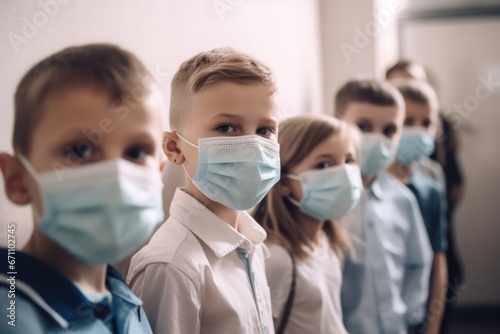 shot of a group of schoolchildren wearing masks in the classroom