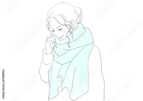 マフラーをした笑顔の女性