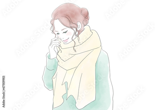 マフラーをした笑顔の女性