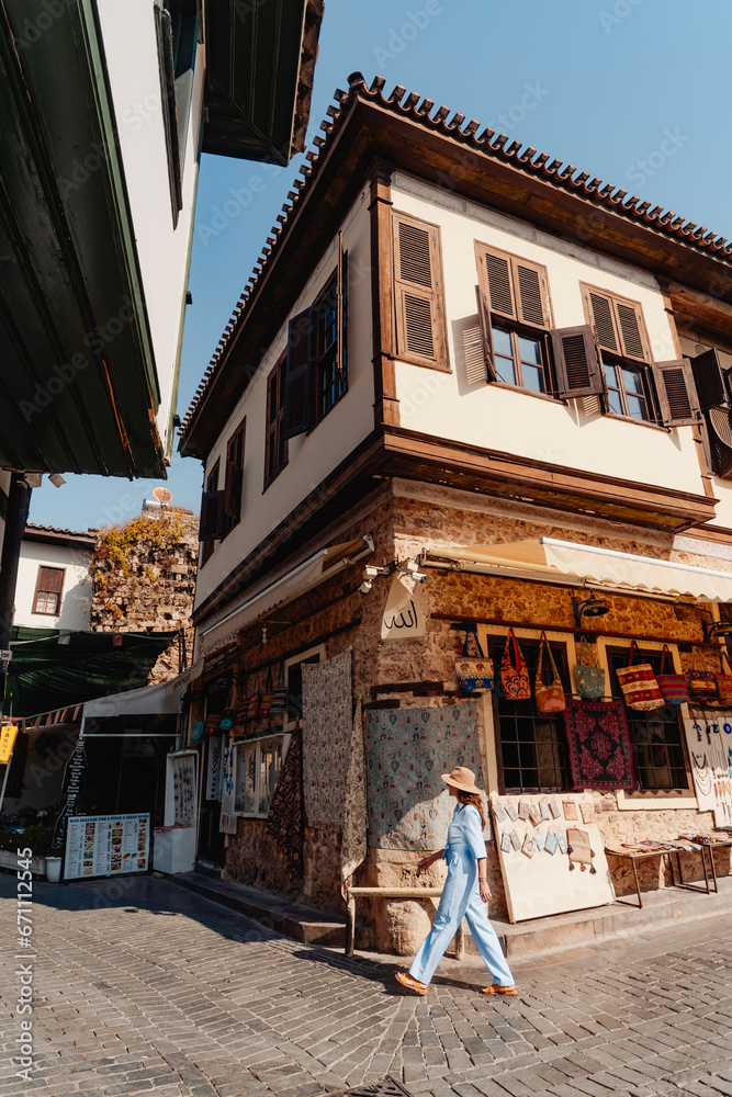 Tourist woman walking in the old town of Antalya in Turkey.