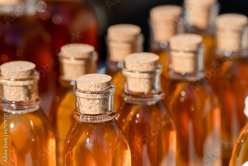 honey bottles with corks at a local farmers market