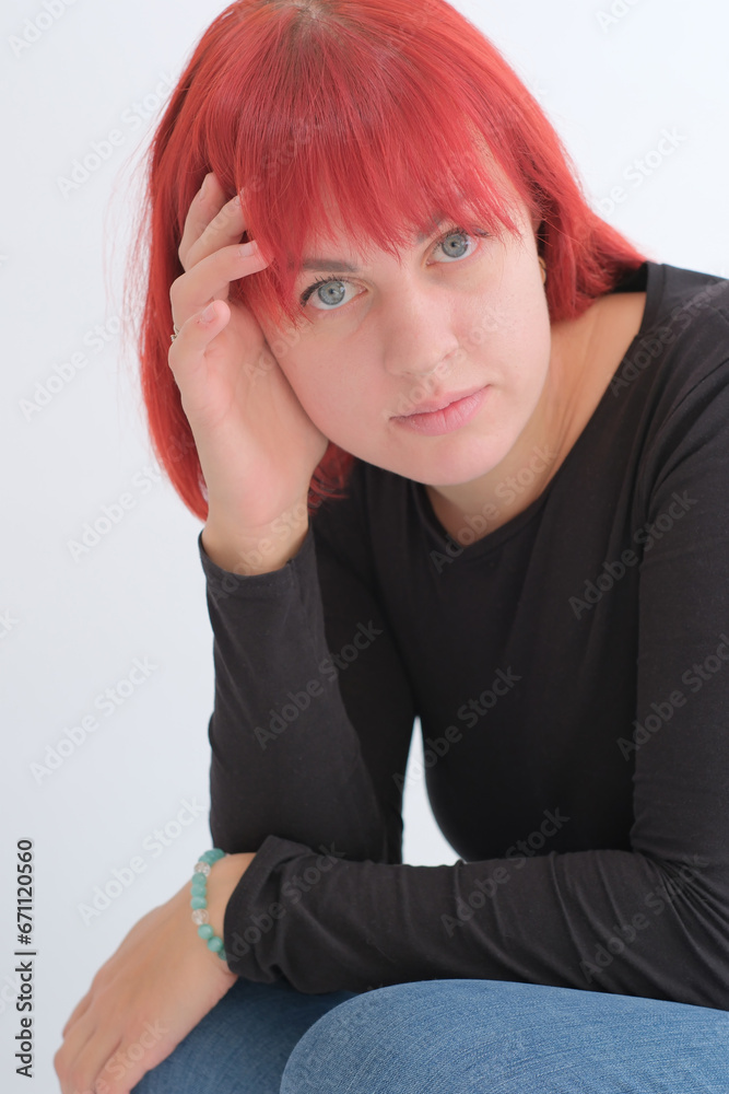 A young attractive woman with a short orange hairstyle A young attractive woman with a short orange hairstyle