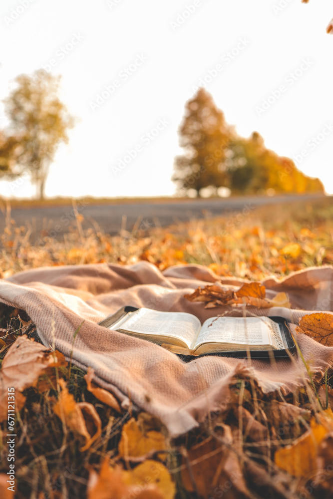 Open Bible on a blanket, autumn Open Bible on a blanket, autumn