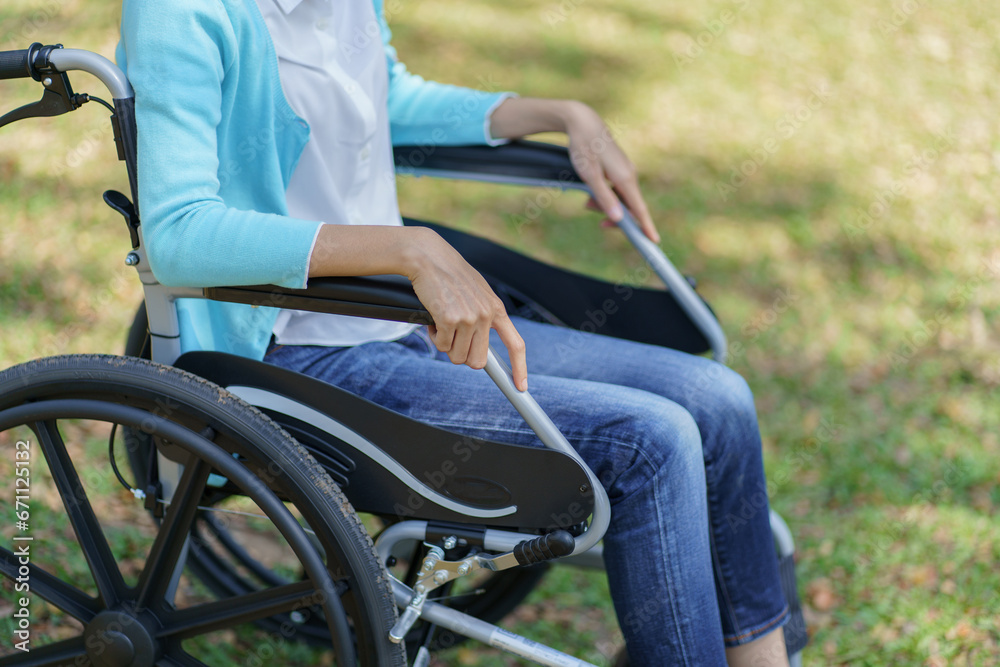 Obraz premium Depressed sad asian woman in wheelchair&nbsp;lonely disabled adult