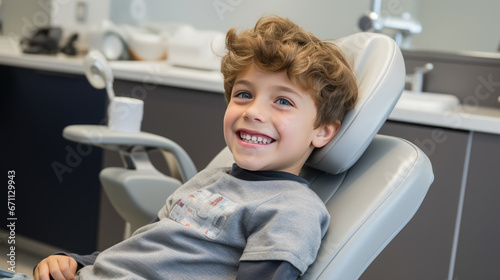 Little boy sits on a chair in a dental clinic