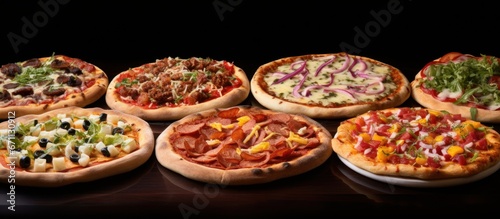 Portions of various delicious oven-baked pizzas.