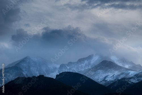 snow clouds over mountains