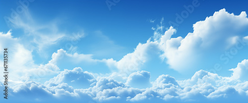 An ultra-wide clouds background capturing the heavenly view from up in the clouds. A serene expanse of blue sky adorned with billowing white clouds  evoking a tranquil and ethereal atmosphere