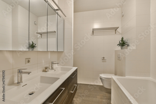 two images of a bathroom with a sink and toilet