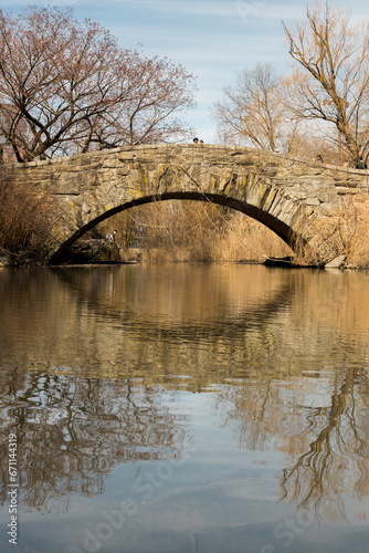On a sunny winter morning at the Gapstow Bridge, one of the icons of Central Park, Manhattan, New York City