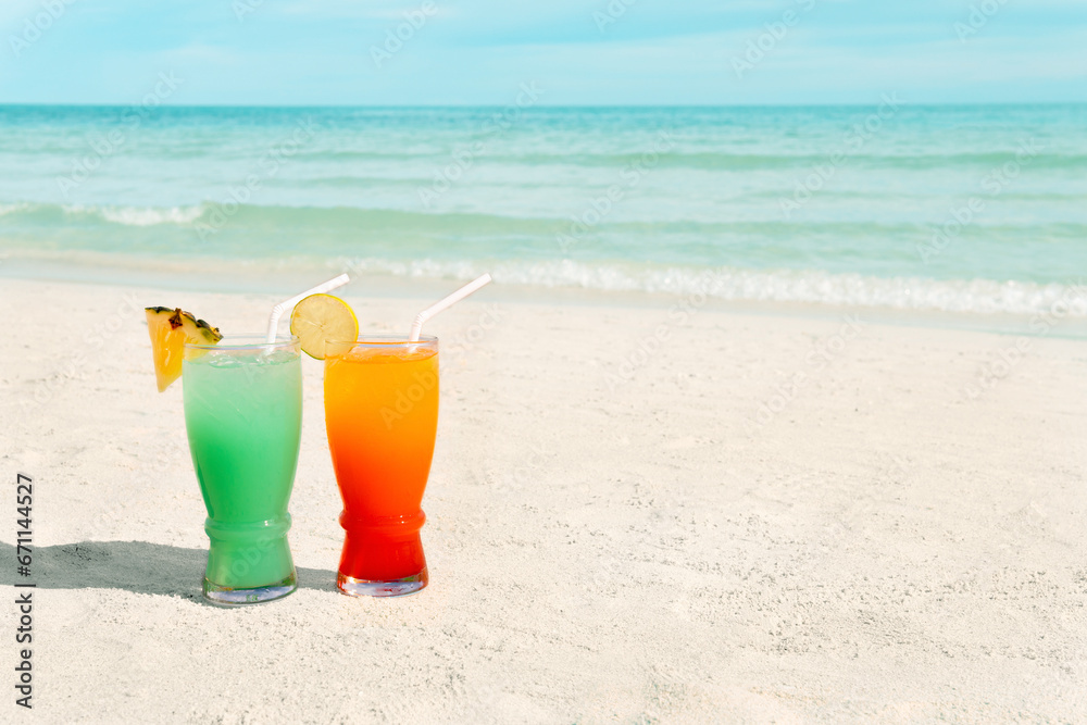 Pair of fruit shakes on the tropical beach
