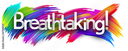 Breathtaking paper word sign with colorful spectrum paint brush strokes over white.