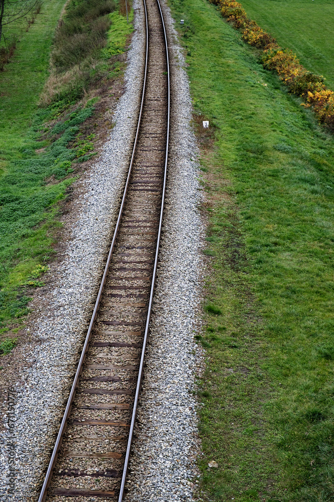 Railway bed. Fragment of railway tracks, top view, rails and sleepers. Railway bed. Fragment of railway tracks, top view, rails and sleepers.