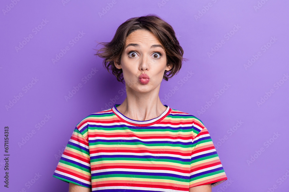 Portrait of impressed gorgeous girl pouted lips kiss impressed reaction isolated on purple color background Portrait of impressed gorgeous girl pouted lips kiss impressed reaction isolated on purple color background