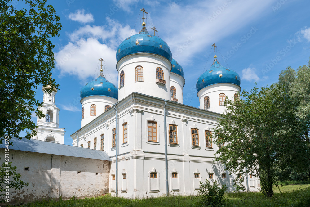 View of the Cathedral in honor of the Exaltation of the Precious and Life-Giving Cross of the Lord on a sunny July day. St. George's Monastery, Veliky Novgorod. Russia