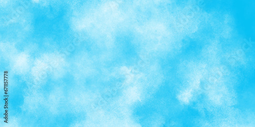 Winter seasonal cloudy and blurry defocused blue sky background with tiny clouds, Winter morning fresh sky with bright and shiny clouds, Sky clouds with brush painted blue watercolor texture.