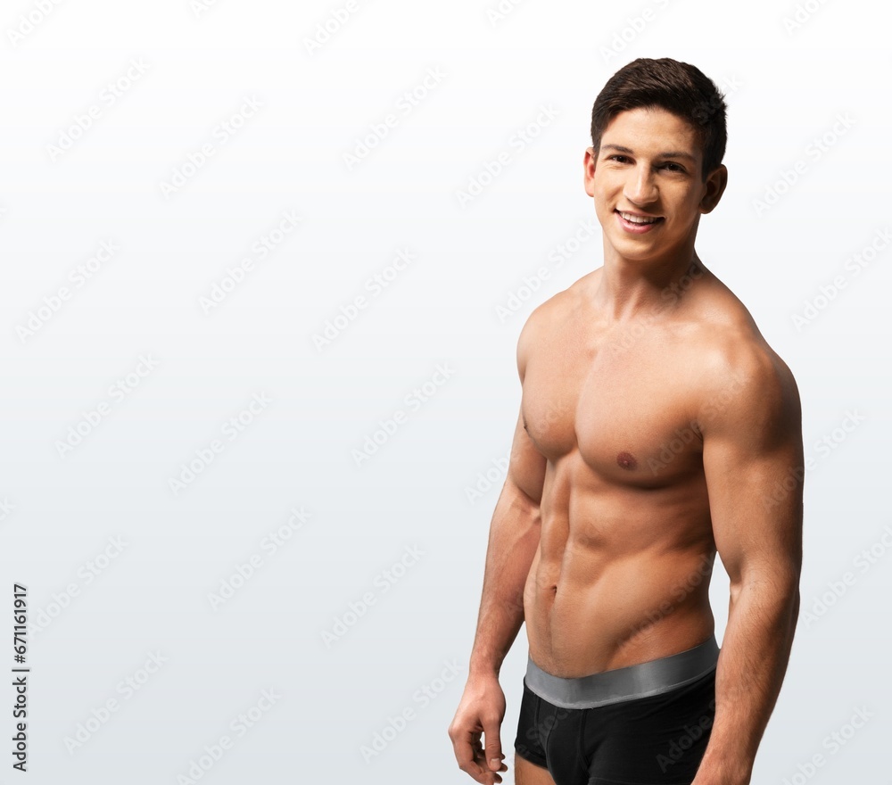 Portrait of happy young man bodybuilder posing Portrait of happy young man bodybuilder posing