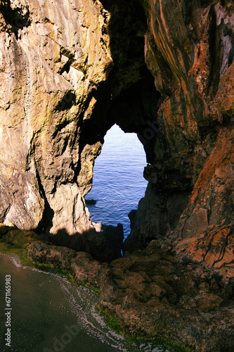 The entrance to the cave on the coast of the Atlantic ocean.