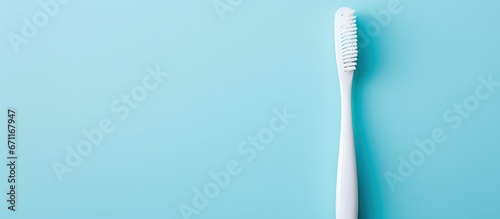 A blue backdrop with a toothbrush