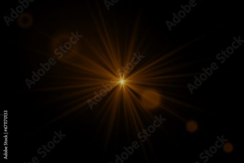 Golden bright star. Light effect bright explosion. A flash of light and glare. Light on a black background.