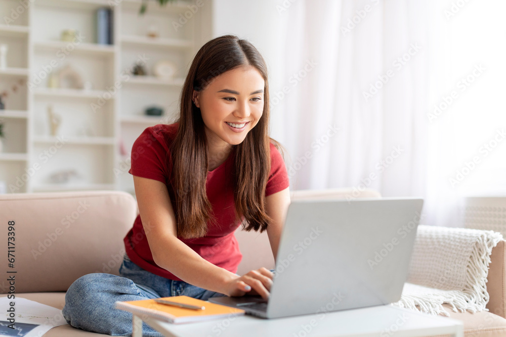 Freelance Concept. Happy Young Asian Woman Working On Laptop At Home Freelance Concept. Happy Young Asian Woman Working On Laptop At Home