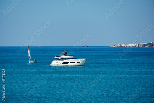 Pleasure yacht in the background of the resort town of Gelendzhik.