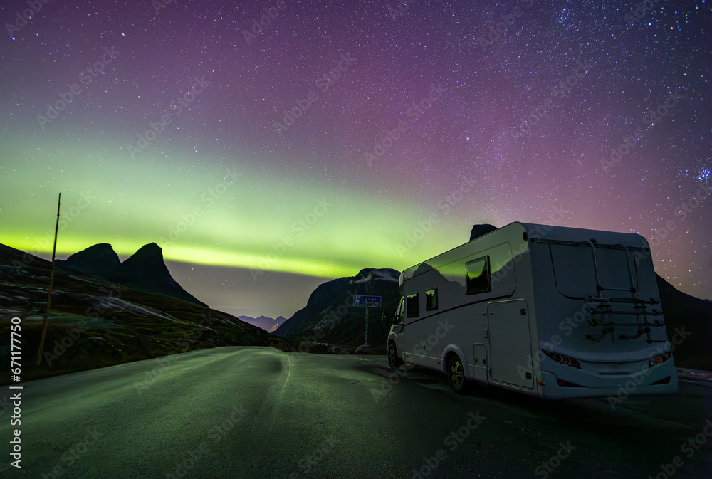 Northern lights and motorhome camper in Trollstigen road in Norway, Europe - obrazy, fototapety, plakaty 