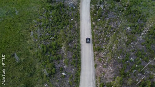 Aerial Footage of UTV on Dirt Road in the Beartooth Mountains, Montana, Summertime